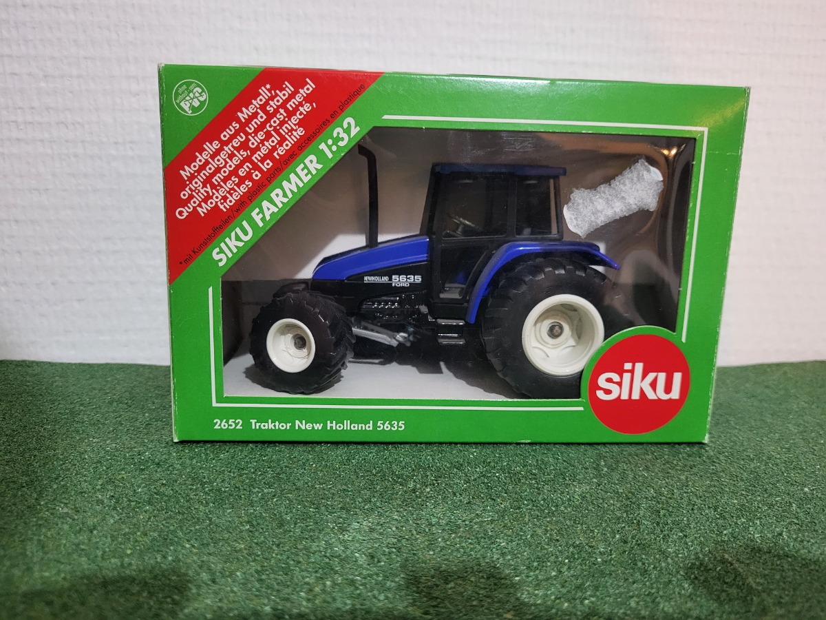 Tracteur new holland SIKU 2652 échelle 1/32 avec boîte